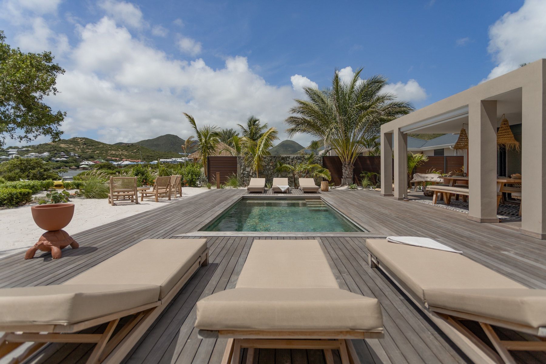 Sun loungers line the pool deck